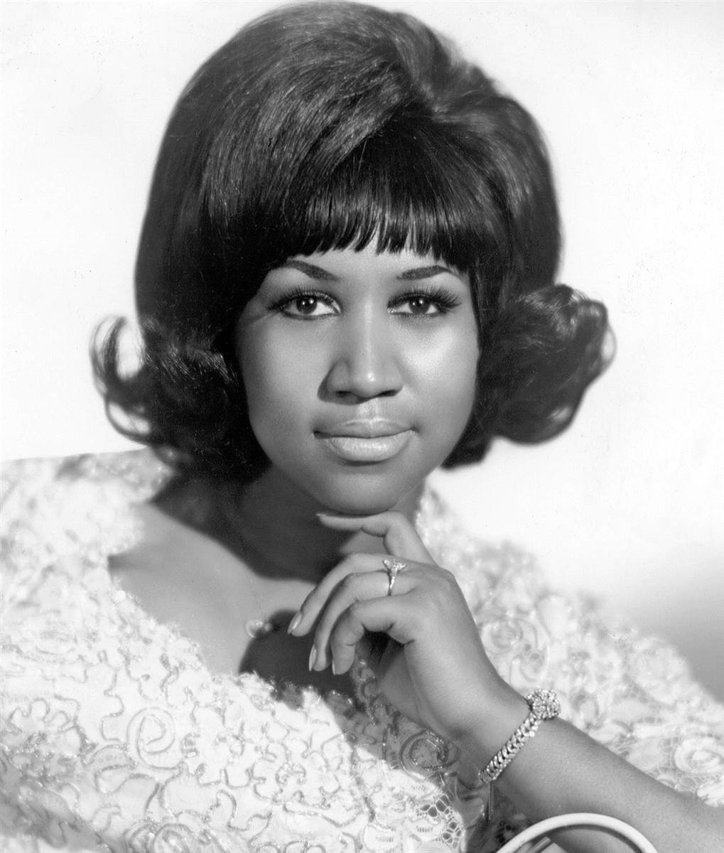 Aretha Franklin in a 1968 Atlantic Records publicity photo, head and shoulders, in black and white.