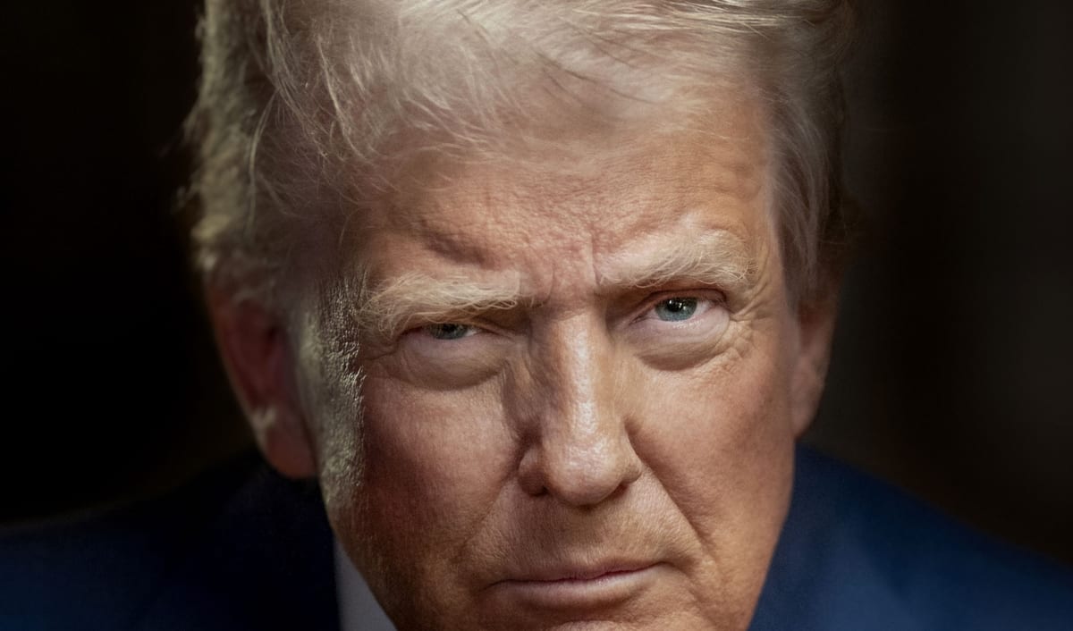 Official 2025 presidential portrait of Donald Trump, in a dark suit against a dark background.
