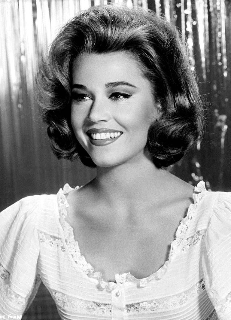Jane Fonda in a 1963 MGM publicity photo for Sunday in New York, head and shoulders, in black and white.