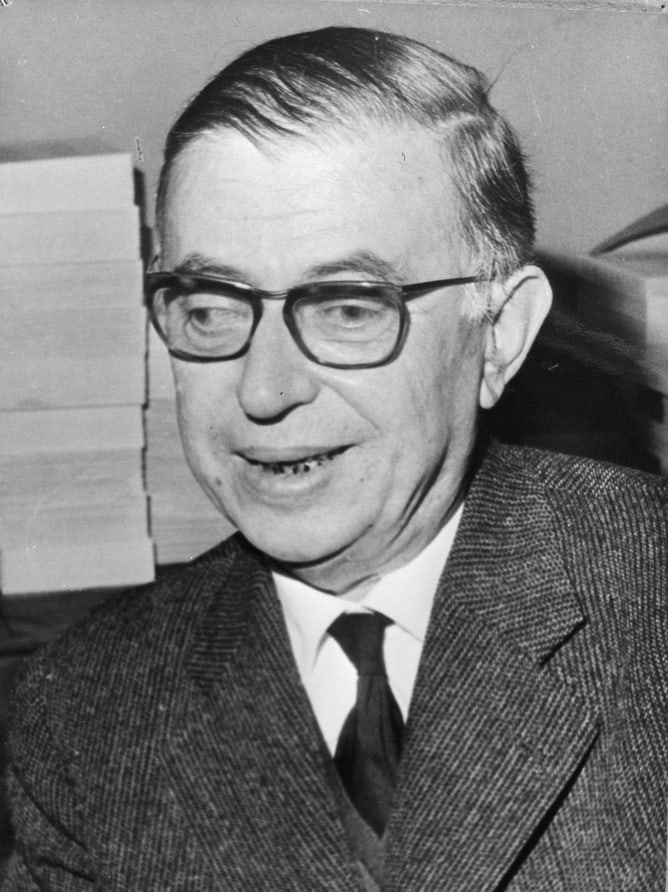 Jean-Paul Sartre photographed in July 1965 for the Dutch press agency Anefo, head and shoulders, in black and white.