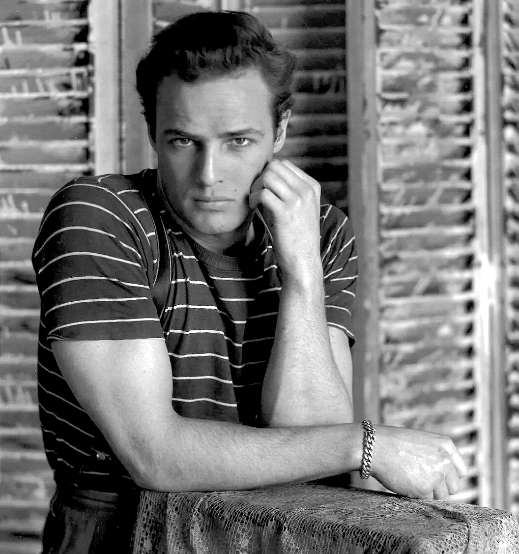 Marlon Brando in a 1948 Studio Harcourt portrait, head and shoulders, in soft black-and-white lighting.