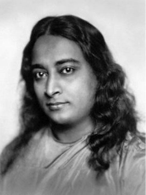 Paramahansa Yogananda in a formal seated portrait from around the time of his 1920 arrival in the United States.